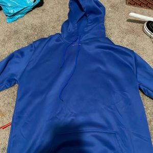 A blue hoodie with the saying “It’s a good day to have a good day”